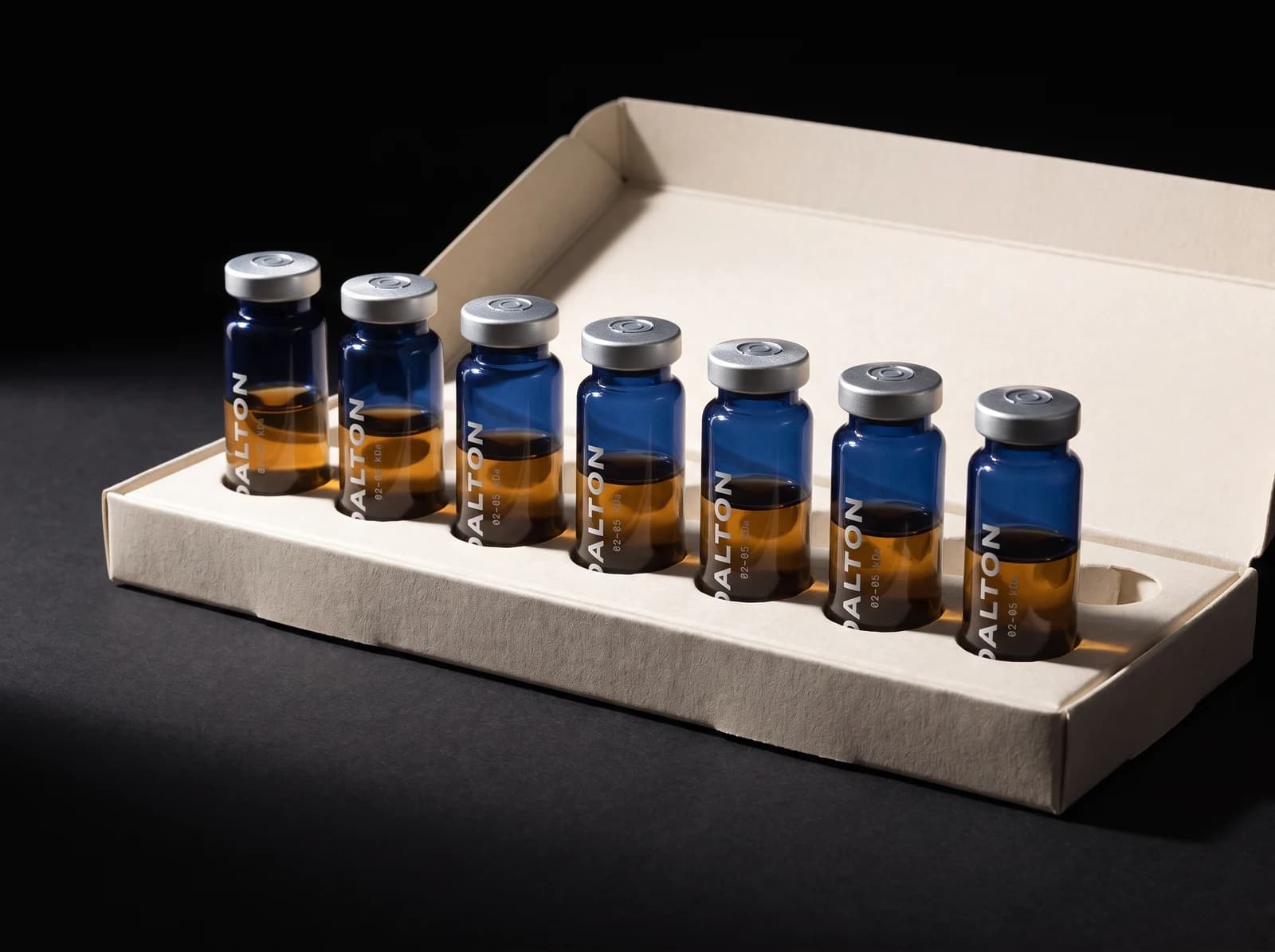 Seven DALTON 02-05 vials in an open bone board tray.